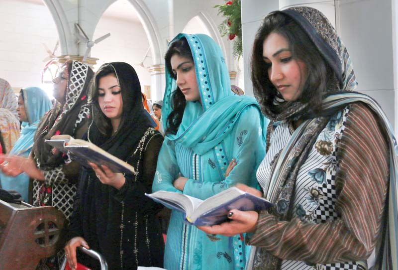 women gather at st john s church to celebrate easter photo muhammad iqbal express