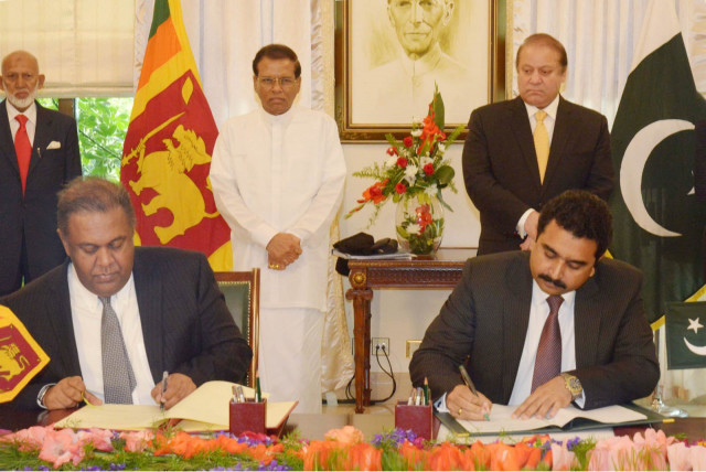 prime minister nawaz sharif and sri lankan president sri sena witness signing of mous between the two countries at the pm house on monday april 6 2015 photo pid prime minister nawaz sharif and sri lankan president sri sena witness signing of mous between the two countries at the pm house on monday april 6 2015 photo pid