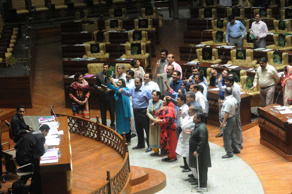 opposition members protest in the session today photo express