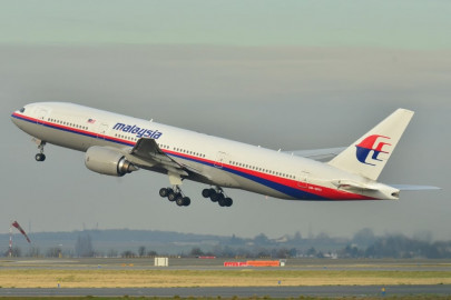 malaysia airlines denies nearly colliding with another plane over pakistan
