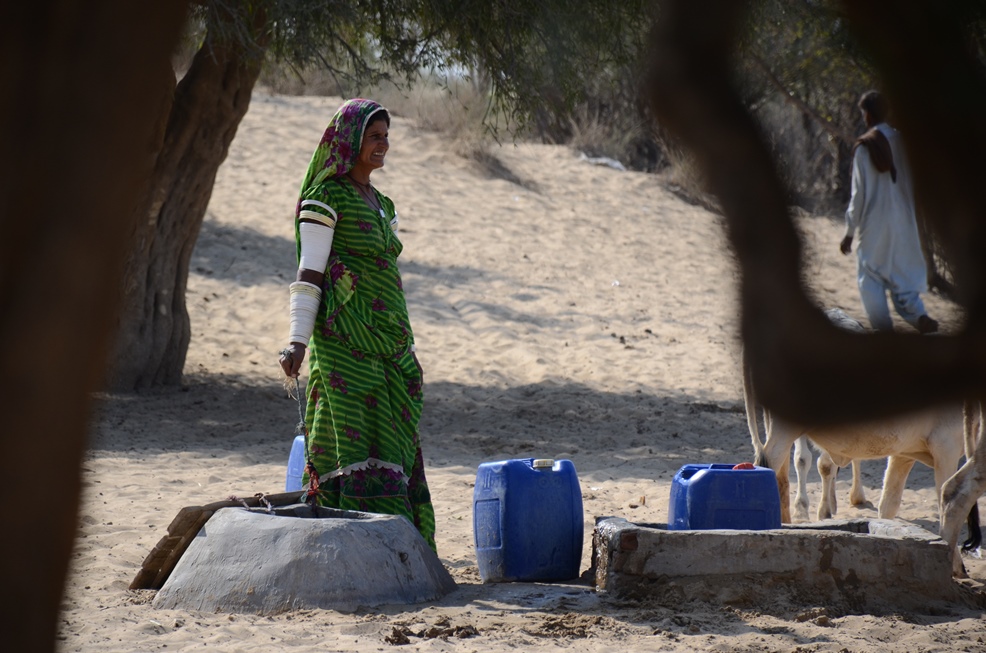 in this photo a woman in tharparkar fetches water from a tank photo mukesh raja