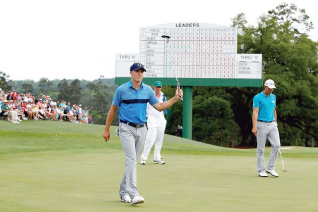 spieth celebrates a birdie on the 18th green for an eight under par 64 during the first round photo afp spieth celebrates a birdie on the 18th green for an eight under par 64 during the first round photo afp
