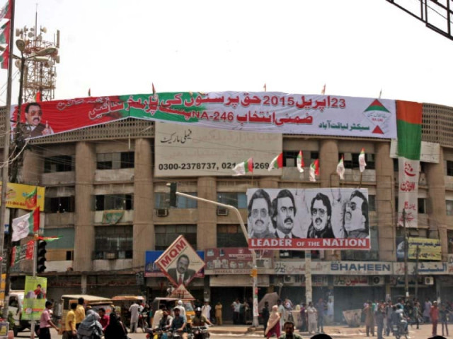 muttahida qaumi movement mqm has put up life size posters at this building in karimabad as part of its campaign for the na 246 by elections photo athar khan express
