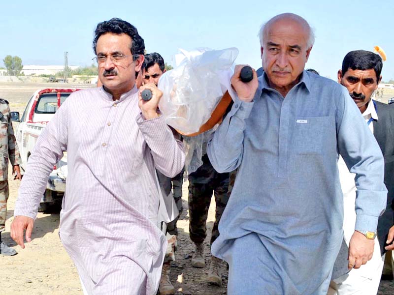 balochistan cm dr abdul malik baloch shoulders the body of a victim of the turbat massacre photo express