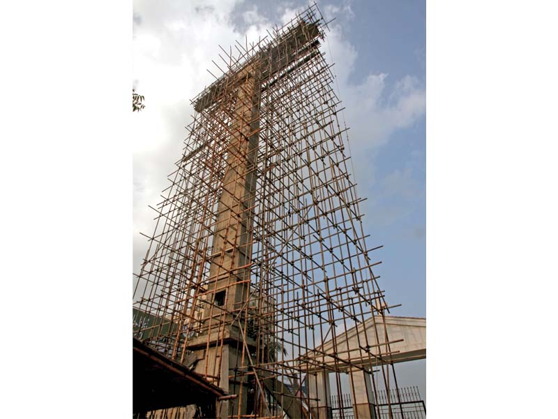 the henry gill family is financing the construction of a 140 foot tall cross in one of the cities oldest christian cemeteries photo athar khan express