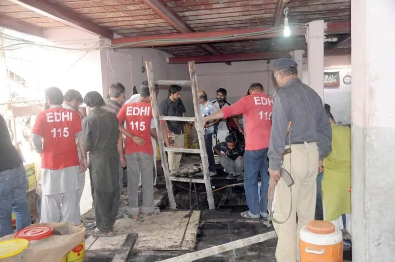 six men died when they jumped one after the other into an underground tank storing chemicals to save their colleague the tank was nearly 20 feet deep photo mohammad azeem express six men died when they jumped one after the other into an underground tank storing chemicals to save their colleague the tank was nearly 20 feet deep photo mohammad azeem express