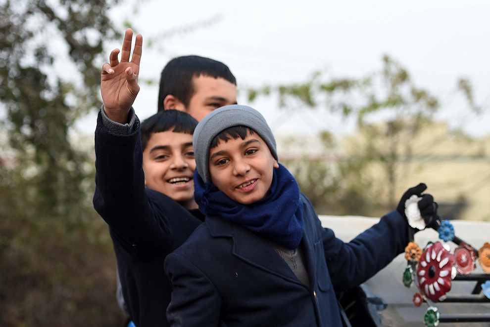 children travel to school in a van photo afp