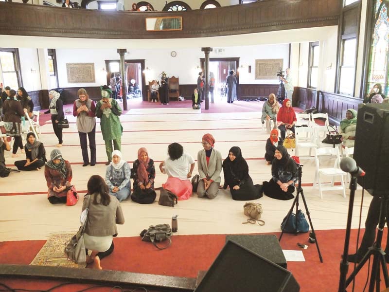 women stream into the space before the jumma prayers begin photos saeed rahman