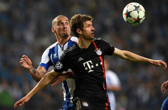 bayern munich 039 s midfielder thomas mueller r vies with fc porto 039 s brazilian defender maicon roque l during the uefa champions league quarter final football match fc porto vs fc bayern munich at the at the dragao stadium in porto on april 15 2015 photo afp bayern munich 039 s midfielder thomas mueller r vies with fc porto 039 s brazilian defender maicon roque l during the uefa champions league quarter final football match fc porto vs fc bayern munich at the at the dragao stadium in porto on april 15 2015 photo afp