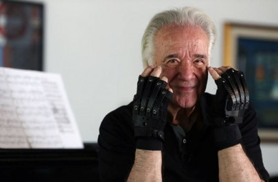 bionic gloves help keep the music playing for brazilian pianist