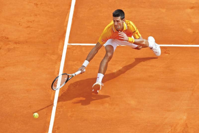 world number one thrashes us open champ cilic in straight sets photo afp