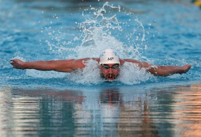 michael phelps competes in the 100m butterfly final during day two of the arena pro swim series at the skyline acquatic center on april 16 2015 in mesa arizona photo afp michael phelps competes in the 100m butterfly final during day two of the arena pro swim series at the skyline acquatic center on april 16 2015 in mesa arizona photo afp