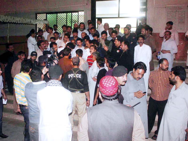 workers from both parties gathered at civil hospital raja bazaar as a show of support after the incident photo zafar aslam express