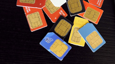 telcos resisting sims block move to face legal action