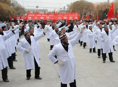 suppressing religious freedoms chinese imams forced to dance in xinjiang region