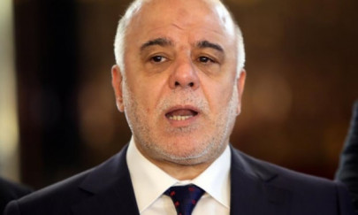 iraq pm s spokesperson resigns over pro saddam song