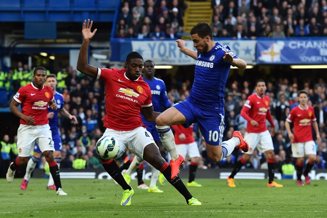 the usual suspect eden hazard was the hero once again for chelsea as a 1 0 win over manchester united has practically handed the title to the blues who enjoy a 10 point advantage over second placed arsenal photo afp