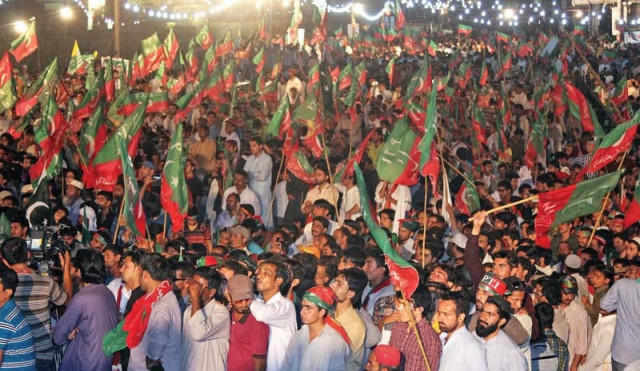 pti supporters listen to the speech of imran khan at a rally photo athar khan express pti supporters listen to the speech of imran khan at a rally photo athar khan express
