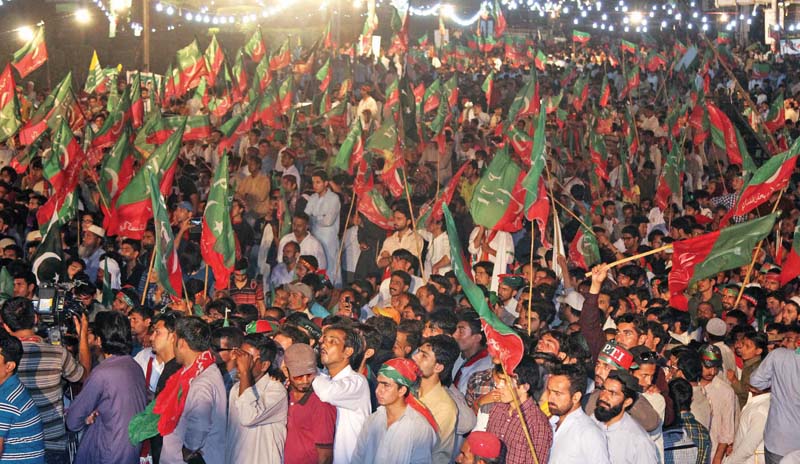 pti supporters listen to the speech of imran khan at a rally photo athar khan express