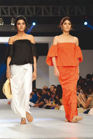 the fashion parade kick started with designers exhibiting an appealing blend of eastern and western silhouettes photos credit malik shafiq express dragon fly the fashion parade kick started with designers exhibiting an appealing blend of eastern and western silhouettes photos credit malik shafiq express dragon fly