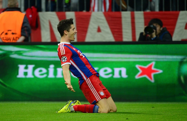 key contributors doubles from robert lewandowski and neymar inspired bayern munich and barcelona respectively into the champions league semi finals on tuesday photos afp