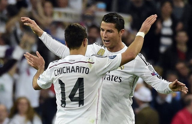 topshots real madrid 039 s portuguese forward cristiano ronaldo r congratulates teammate real madrid 039 s mexican forward javier hernandez l after the uefa champions league quarter finals second leg football match real madrid cf vs club atletico de madrid at the santiago bernabeu stadium in madrid on april 22 2015 real madrid won 1 0 photo afp topshots real madrid 039 s portuguese forward cristiano ronaldo r congratulates teammate real madrid 039 s mexican forward javier hernandez l after the uefa champions league quarter finals second leg football match real madrid cf vs club atletico de madrid at the santiago bernabeu stadium in madrid on april 22 2015 real madrid won 1 0 photo afp
