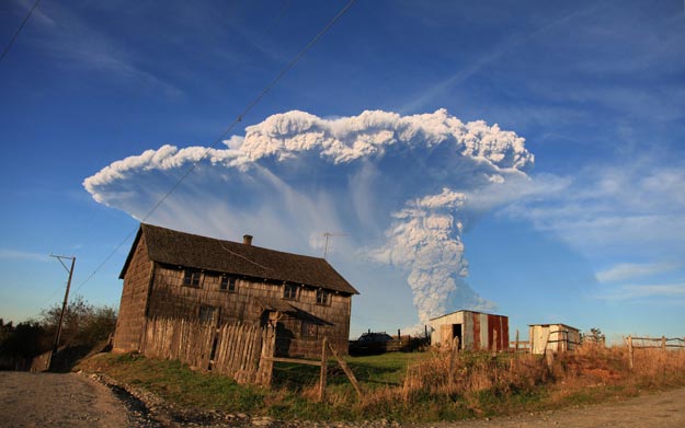 view from puerto varas southern chile of a high column of ash and lava spewing from the calbuco volcano on april 22 2015 photo afp