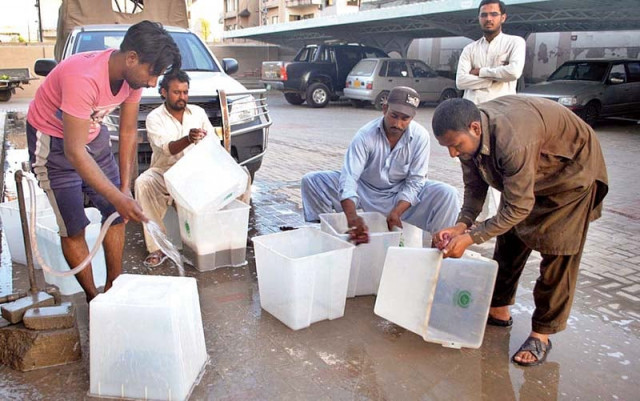 government officials prepare ballot boxes for cantonment elections in rawalpindi photo nni government officials prepare ballot boxes for cantonment elections in rawalpindi photo nni