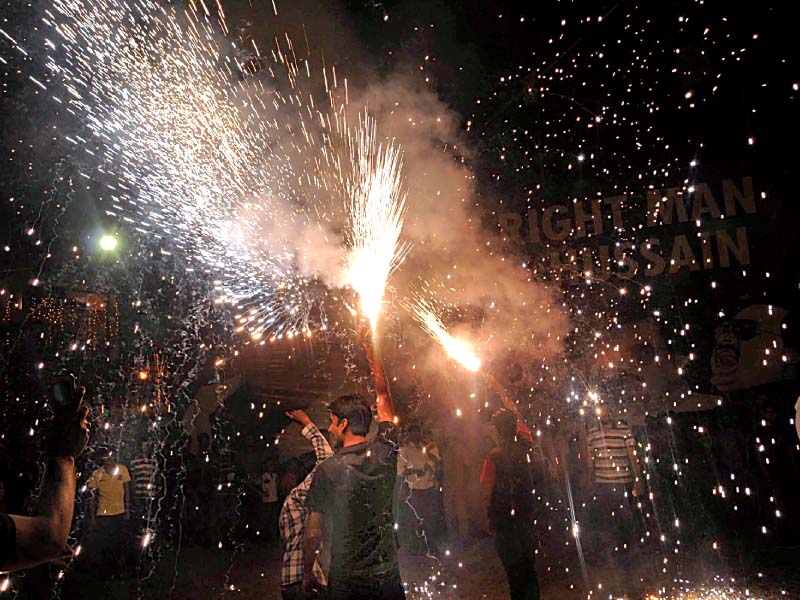 mqm supporters light fireworks on winning na 246 by polls photo mohammad noman express