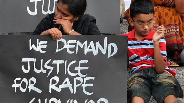 activists and children staged a silent demonstration against sexual assault and rapes on women in bangalore on april 22 2015