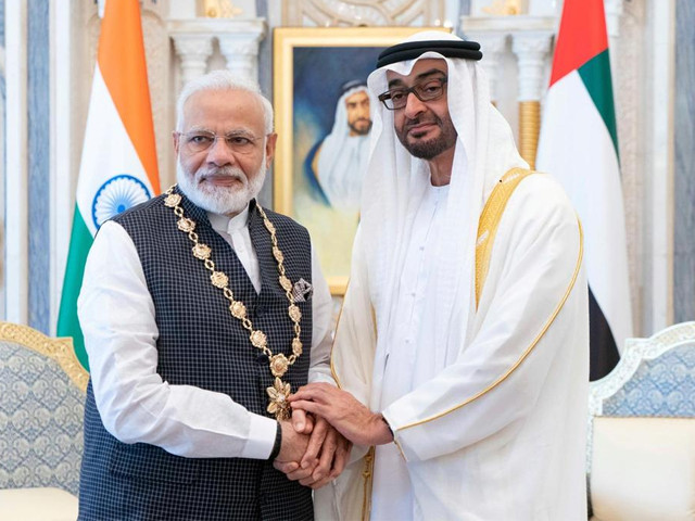 sheikh mohamed bin zayed crown prince of abu dhabi presents a zayed medal to indian prime minister narendra modi photo uae ministry of affairs sheikh mohamed bin zayed crown prince of abu dhabi presents a zayed medal to indian prime minister narendra modi photo uae ministry of affairs