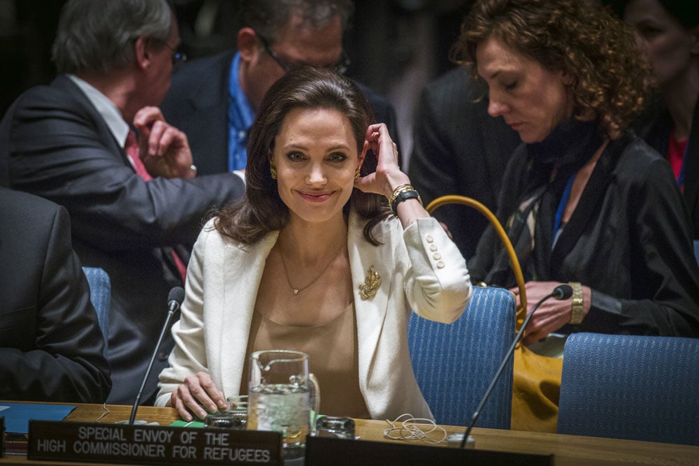 united nations high commissioner for refugees unhcr special envoy actress angelina jolie c reacts before speaking during a united nations security council meeting regarding the refugee crisis in syria at the united nations headquarters in new york april 24 2015 photo reuters