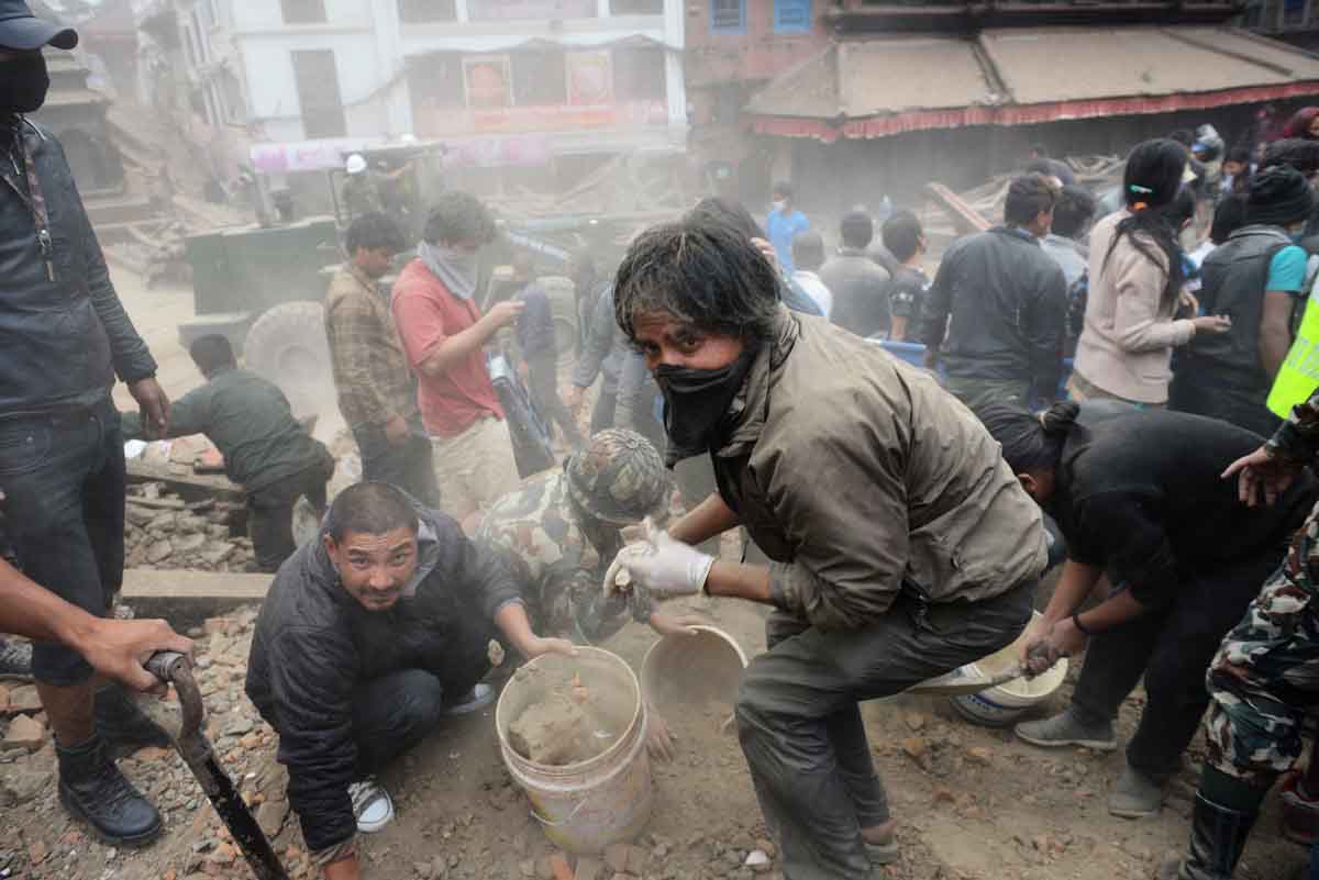 rescuers clear rubble in kathmandu photo afp