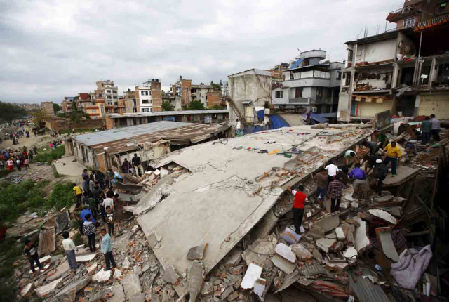people try to rescue those trapped under a collapsed house in nepal after an earthquake of 7 8 magnitude struck on april 25 2015 photo reuters people try to rescue those trapped under a collapsed house in nepal after an earthquake of 7 8 magnitude struck on april 25 2015 photo reuters