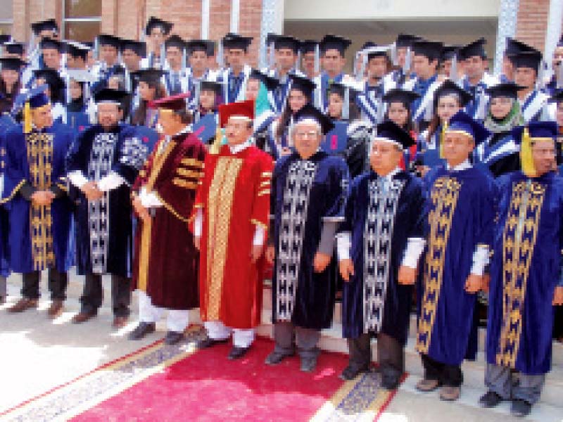 recently awarded degree holders pose with chief minister qaim ali shah at sukkur institute of business administration s second convocation photo express