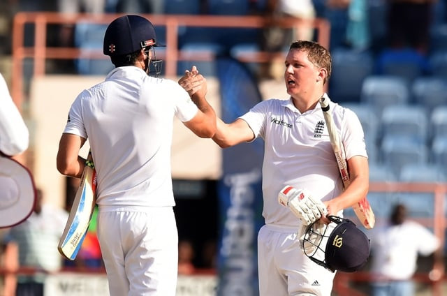 england 039 s cricket team captain alastair cook and teammate gary ballance celebrate defeating west indies during the final day of the second test cricket match between the west indies and england at the grenada national cricket stadium in saint george 039 s on april 25 2015 england won the match by 9 wickets to gain 1 0 lead in the three match test series with the first one being draw photo afp england 039 s cricket team captain alastair cook and teammate gary ballance celebrate defeating west indies during the final day of the second test cricket match between the west indies and england at the grenada national cricket stadium in saint george 039 s on april 25 2015 england won the match by 9 wickets to gain 1 0 lead in the three match test series with the first one being draw photo afp