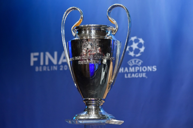 the champions league trophy in display at the announcement of the semi final draws photo afp
