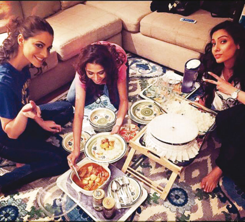 nooray bhatti plays a fine host and entertains fellow models visiting from karachi with home cooked aloo gosht and achaar