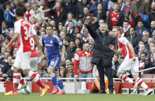 the blues took one step closer to winning the premier league title after a goalless draw against arsenal and two wins will mathematically secure the title for chelsea photo afp the blues took one step closer to winning the premier league title after a goalless draw against arsenal and two wins will mathematically secure the title for chelsea photo afp