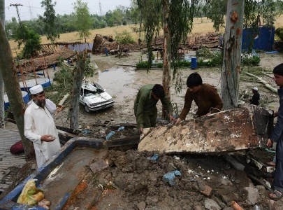 three dead 12 injured as storm batters peshawar