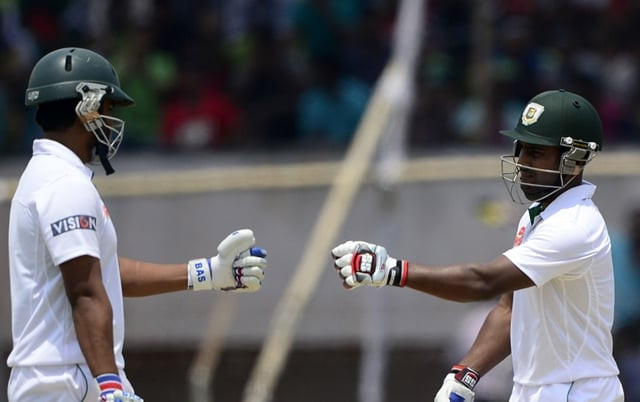 bangladesh cricketer tamim iqbal l celebrates with teammate imrul kayes r after hitting a boundary during the fourth day of the first cricket test match between bangladesh and pakistan at the sheikh abu naser stadium in khulna on may 1 2015 photo afp bangladesh cricketer tamim iqbal l celebrates with teammate imrul kayes r after hitting a boundary during the fourth day of the first cricket test match between bangladesh and pakistan at the sheikh abu naser stadium in khulna on may 1 2015 photo afp