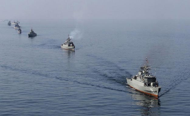 iranian warships regularly conduct military drills in the strait of hormuz    where a third of the world 039 s traded oil supplies pass through the narrow sea passage photo afp