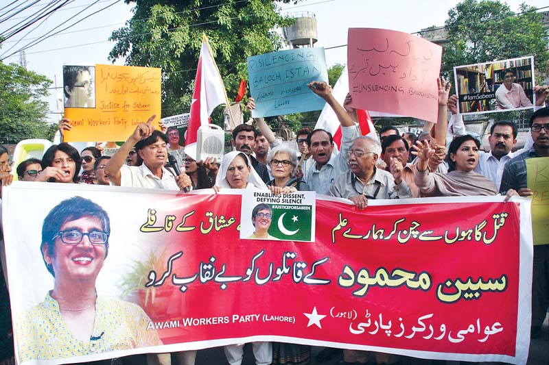 protestors chant slogans in memory of the late activist who was shot and killed after a talk at her cafe in karachi on balochistan photo abid nawaz express