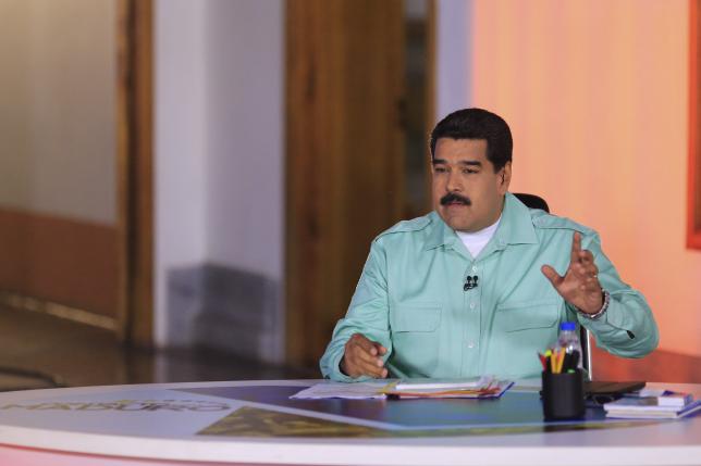 venezuela 039 s president nicolas maduro speaks during his weekly broadcast 039 039 en contacto con maduro 039 039 in contact with maduro in caracas in this april 14 2015 handout picture provided by miraflores palace photo reuters