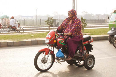 female motorcyclist keep right female motorcyclist keep right