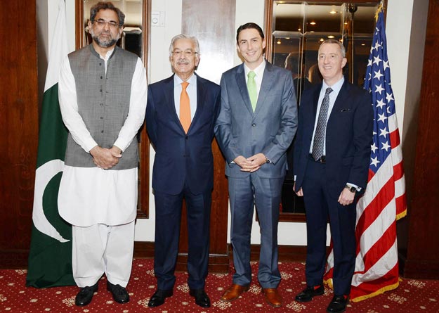 us state department s special envoy for energy amos hochstein 2r in a group photo with federal minister for water and power khawaja asif federal minister for petroleum and natural resources shahid khaqan abbasi photo pid