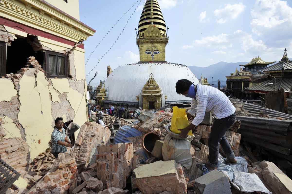 people sift through the rubble in kathmandu photo reuters