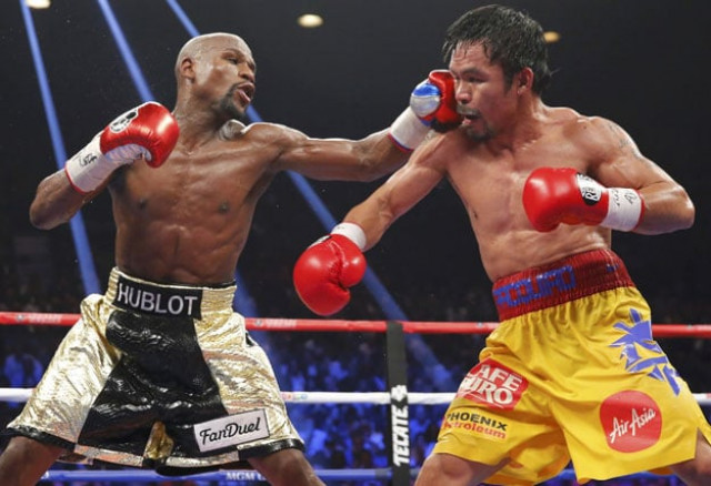 floyd mayweather jr of the u s lands a left to the face of manny pacquiao of the philippines r in the 11th round during their welterweight wbo wbc and wba super title fight in las vegas nevada may 2 2015 photo afp floyd mayweather jr of the u s lands a left to the face of manny pacquiao of the philippines r in the 11th round during their welterweight wbo wbc and wba super title fight in las vegas nevada may 2 2015 photo afp