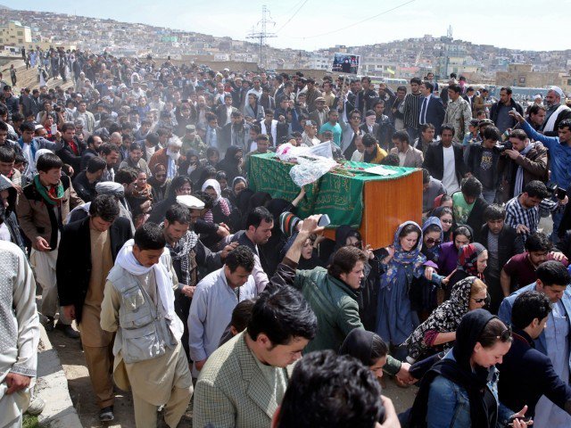 the body of farkhunda 27 who was lynched on thursday by an angry mob in central kabul was carried to the graveyard by women amid crowds of men photo ap