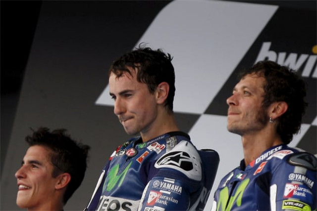 yamaha motogp rider jorge lorenzo of spain listens the spanish national anthem next to honda motogp rider marc marquez photo reuters yamaha motogp rider jorge lorenzo of spain listens the spanish national anthem next to honda motogp rider marc marquez photo reuters
